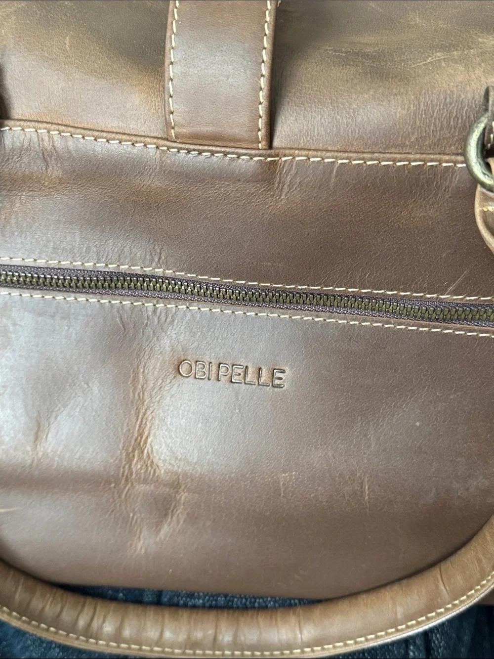 Classic Brown Distressed Leather Duffel Bag with Front Buckle Pocket, no strap